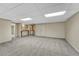 Finished basement recreation room with wet bar and built-in shelving at 23480 E Moraine Pl, Aurora, CO 80016