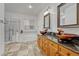 Spa-like bathroom featuring a soaking tub, double sinks, and a walk-in shower at 23480 E Moraine Pl, Aurora, CO 80016