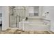 Bathroom with shower, bathtub, and tile flooring at 23480 E Moraine Pl, Aurora, CO 80016