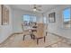 Bright dining room with hardwood floors and seating for four at 23480 E Moraine Pl, Aurora, CO 80016