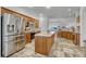 Spacious kitchen featuring stainless steel appliances and an island at 23480 E Moraine Pl, Aurora, CO 80016