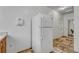 White refrigerator in kitchen area at 23480 E Moraine Pl, Aurora, CO 80016