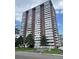 Spacious high-rise apartment building with multiple stories and lots of windows at 3131 E Alameda Ave # 604, Denver, CO 80209