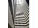 Open interior courtyard with multi story balconies at 3131 E Alameda Ave # 604, Denver, CO 80209