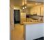 View of a standard kitchen with white cabinets and appliances at 3131 E Alameda Ave # 604, Denver, CO 80209