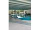 Indoor pool with ample lounge seating and natural light at 3131 E Alameda Ave # 604, Denver, CO 80209
