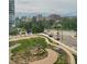 Serene view featuring trees and a paved walkway at 3131 E Alameda Ave # 604, Denver, CO 80209