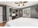 Bedroom with large closet and terracotta tile floor at 401 S Dover Ct, Lakewood, CO 80226