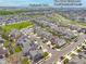 Aerial view of the property, highlighting the community's parks, pool, tennis courts and proximity to Brier Ct at 12940 Brier Ct, Firestone, CO 80504