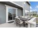 Charming outdoor patio with a dining table and chairs perfect for al fresco meals and relaxing at 12940 Brier Ct, Firestone, CO 80504