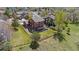 Aerial view of house and fenced backyard surrounded by a beautiful, green neighborhood at 20670 Bridlewood Ln, Parker, CO 80138