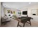 Finished basement with a foosball table, living area, and decor at 20670 Bridlewood Ln, Parker, CO 80138