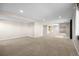 Spacious basement area with carpeting, recessed lights, and space for entertaining at 20670 Bridlewood Ln, Parker, CO 80138