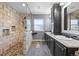Primary bathroom features a glass enclosed shower and dual vanity at 20670 Bridlewood Ln, Parker, CO 80138