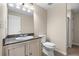 Bathroom featuring a vanity with granite countertop, decorative sink and tile flooring at 20670 Bridlewood Ln, Parker, CO 80138