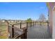 Relax and unwind on the outdoor deck with scenic neighborhood views and wood railings at 20670 Bridlewood Ln, Parker, CO 80138