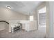 Upper-level hallway features built-in desk and neutral color scheme at 20670 Bridlewood Ln, Parker, CO 80138