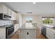 Beautiful kitchen with a large island, stainless steel appliances, and scenic views at 20670 Bridlewood Ln, Parker, CO 80138