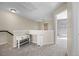 Landing with desk space, gray carpet, and beige walls at 20670 Bridlewood Ln, Parker, CO 80138