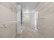 Spacious walk-in closet with carpet, white wire shelving, and ample storage space at 20670 Bridlewood Ln, Parker, CO 80138