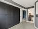 Bedroom featuring built-in storage and access to ensuite bathroom at 5204 S Parfet Way, Littleton, CO 80127
