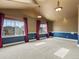Spacious bedroom with three windows offering lots of natural light at 5204 S Parfet Way, Littleton, CO 80127