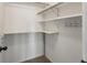 Walk-in closet with shelving and rack for organized storage at 5204 S Parfet Way, Littleton, CO 80127