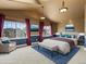 Comfortable main bedroom features views of the outdoors at 5204 S Parfet Way, Littleton, CO 80127