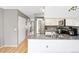 Kitchen with granite countertops, stainless steel appliances, and white cabinets at 9632 W Cornell Pl, Lakewood, CO 80227