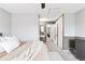 Spacious main bedroom boasts natural light, plush carpeting, and serene ambiance at 9632 W Cornell Pl, Lakewood, CO 80227