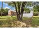Lush backyard featuring mature trees providing shade, enhancing privacy and creating a serene setting at 1760 W 74Th Way, Denver, CO 80221