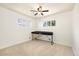 Bedroom featuring carpeted floors and a ceiling fan at 1760 W 74Th Way, Denver, CO 80221