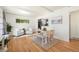 Bright dining area featuring modern furniture and hardwood floors at 1760 W 74Th Way, Denver, CO 80221