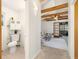 Bright interior shot featuring an open living space and a powder room at 1760 W 74Th Way, Denver, CO 80221