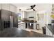 Well-equipped kitchen with gray cabinets and stainless steel appliances at 1760 W 74Th Way, Denver, CO 80221