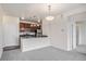 Open kitchen featuring granite countertops, stainless steel appliances and wood cabinetry at 4100 Albion St # 617, Denver, CO 80216