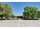 Building exterior with parking and landscaping in a suburban community at 5254 W Oberlin Dr, Denver, CO 80235