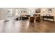 Cozy living room with hardwood floors, comfortable seating, and modern decor at 5254 W Oberlin Dr, Denver, CO 80235