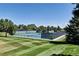 An outdoor tennis court in a well-maintained complex at 5254 W Oberlin Dr, Denver, CO 80235