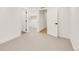 Bedroom with neutral walls, neutral carpet, and closet at 4721 Elm Ct, Denver, CO 80211