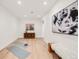 Bonus room features modern decor, neutral walls, and new flooring. Great flex space! at 4721 Elm Ct, Denver, CO 80211