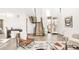 Spacious foyer with a modern staircase, sleek decor, and ample natural light at 4721 Elm Ct, Denver, CO 80211