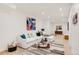 Modern living room with stylish decor, neutral walls, and decorative area rug at 4721 Elm Ct, Denver, CO 80211