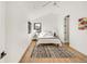 Bright main bedroom with vaulted ceilings, neutral decor, and modern ceiling fan at 4721 Elm Ct, Denver, CO 80211