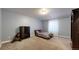 Bedroom featuring a decorative ceiling, carpeted floor, and a themed bed and a toy dinosaur at 18009 E 47Th Pl, Denver, CO 80249
