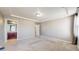 Expansive bedroom showcasing tray ceiling and recessed lighting at 18009 E 47Th Pl, Denver, CO 80249