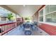 Covered patio featuring a large outdoor dining table and chairs, ideal for entertaining guests at 18009 E 47Th Pl, Denver, CO 80249
