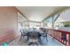 Spacious covered patio with outdoor dining area, perfect for enjoying meals and gatherings at 18009 E 47Th Pl, Denver, CO 80249