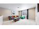 Cozy living room with comfortable seating and stylish decor at 18009 E 47Th Pl, Denver, CO 80249