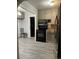 Bright kitchen featuring stainless steel appliances and ample storage, perfect for cooking and entertaining at 3345 W Evans Ave, Denver, CO 80219